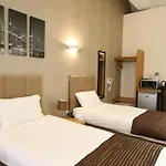 New County Hotel & Serviced Apartments By Roomsbooked