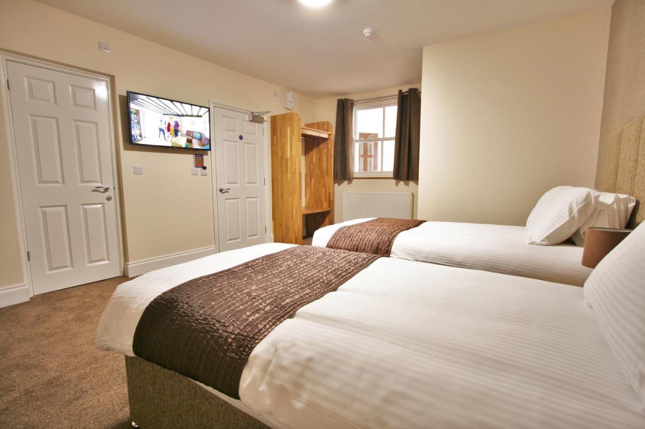 New County & Serviced By Roomsbooked Hotel