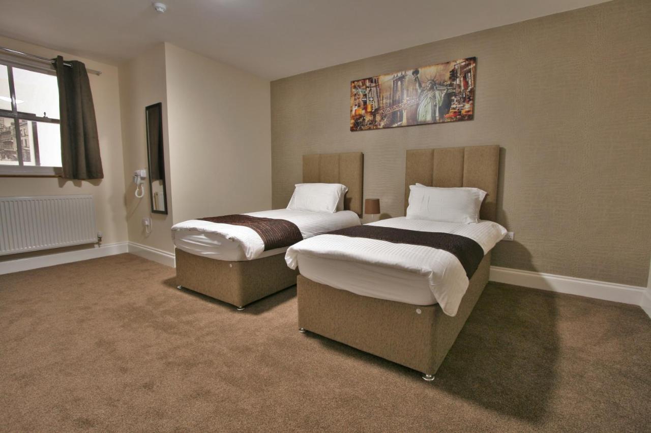 New County & Serviced By Roomsbooked Hotel